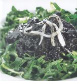 Risotto al nero con seppie e bietole